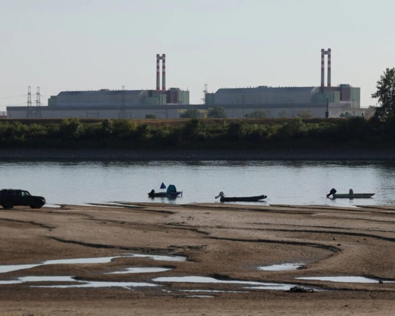 Paks Nuclear Power Plant with the partially dried-up Danube riverbed in Dunaszentbenedek, Hungary, July 31, 2026. REUTERS/Bernadett Szabo