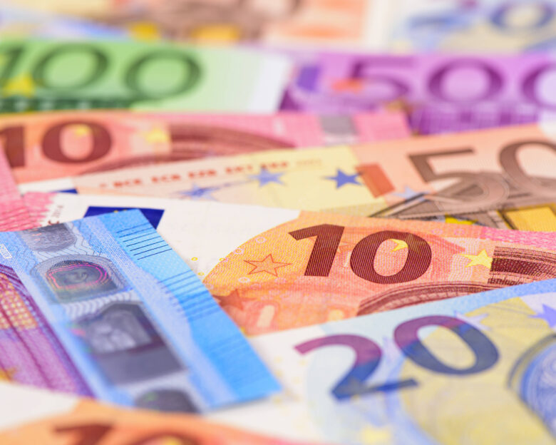Many euro banknotes and bills are togethe