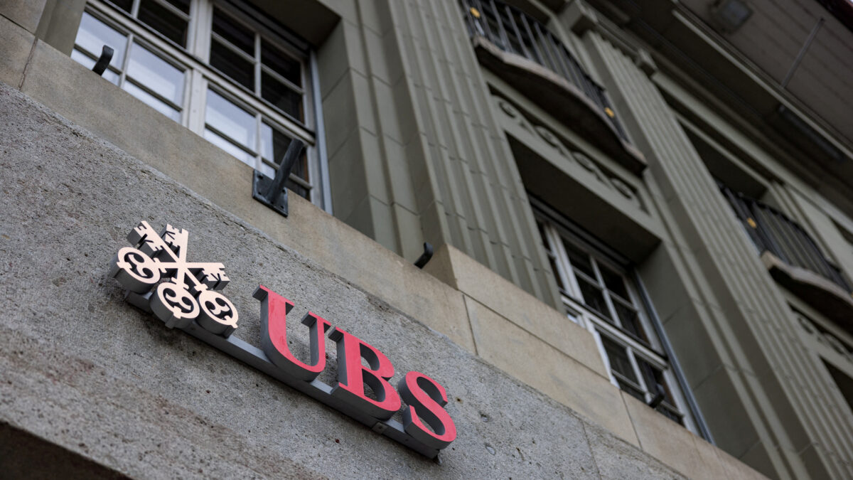 FILE PHOTO: The UBS logo is pictured on a building next to the Federal Palace of Switzerland, in Bern, Switzerland, December 11, 2025.