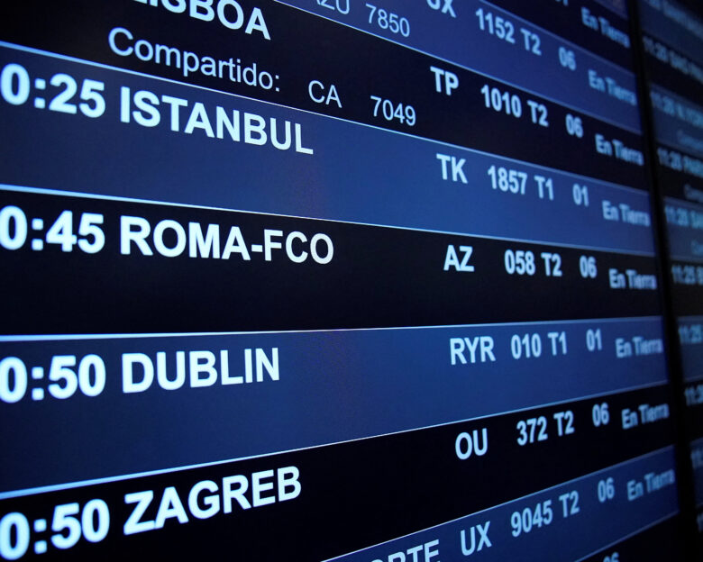 An information panel displays flight details at Adolfo Suarez Madrid–Barajas Airport, as Spain's government said it would establish border controls for flights and ships from Italy, from midnight on Saturday until September 7, in a dispute over irregular migration, in Madrid, Spain August 8, 2026.