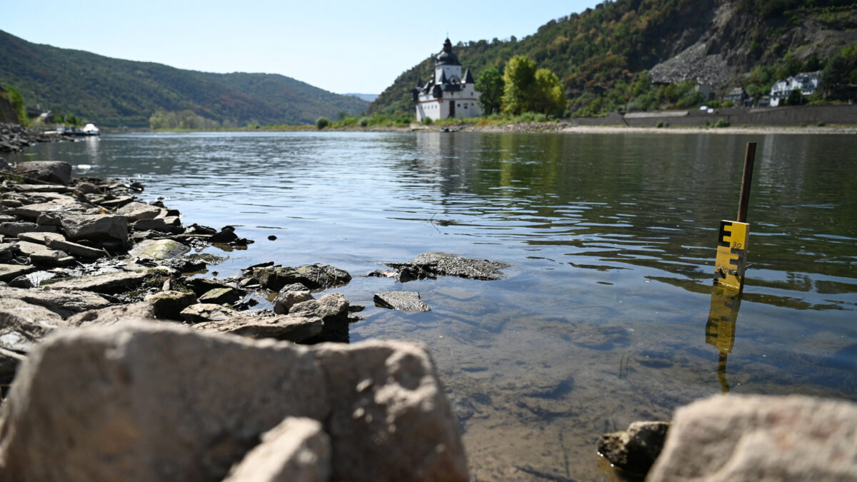 A yellow and black water level gauge is placed near the Kaub gauging station (Kauber Pegelturm) in the Rhine river during prolonged dry weather across Europe that causes massive consequences for German industry, in Kaub, Germany, August 10, 2026.