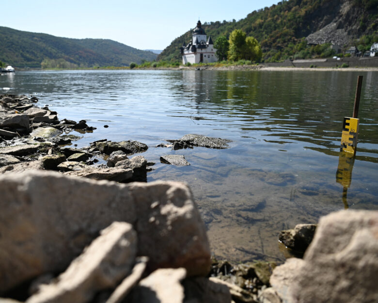 A yellow and black water level gauge is placed near the Kaub gauging station (Kauber Pegelturm) in the Rhine river during prolonged dry weather across Europe that causes massive consequences for German industry, in Kaub, Germany, August 10, 2026.