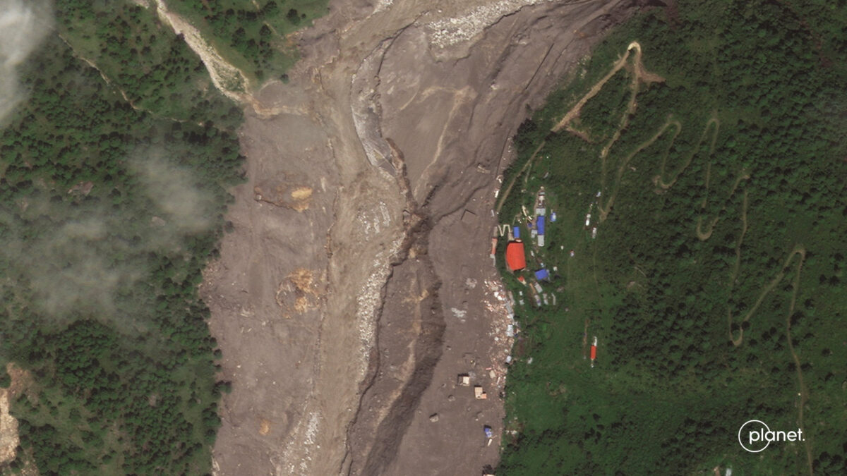 A satellite image shows Timure in Nepal after flash floods and a mudslide, August 27, 2026.    2026 PLANET LABS PBC