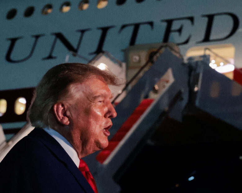 U.S. President Donald Trump speaks to members of the media after disembarking Air Force One at Joint Base Andrews, Maryland, U.S., August 11, 2026. REUTERS/Kylie Cooper