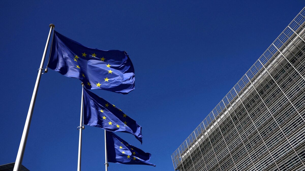 FILE PHOTO: European Union flags flutter outside the European Commission headquarters in Brussels, Belgium