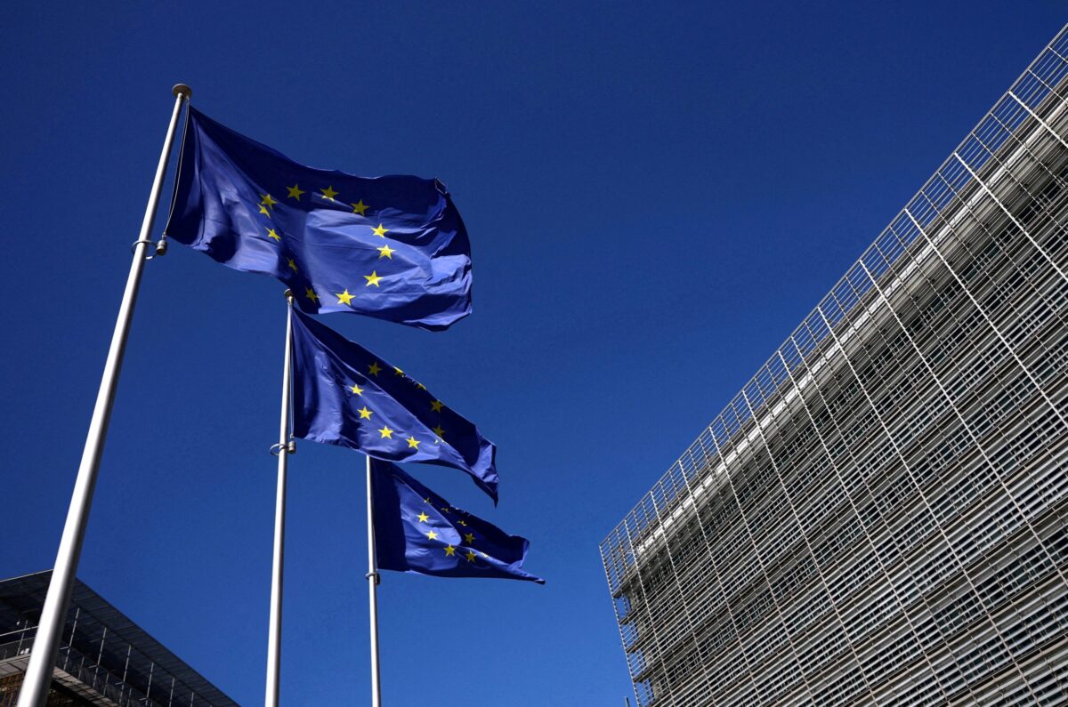 FILE PHOTO: European Union flags flutter outside the European Commission headquarters in Brussels, Belgium