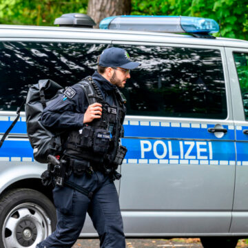 German policeman in the Bohemian Switzerland National Park, Hrensko, Czech Republic, on May 14, 2026. Every year German tourists head to the reserve to celebrate Vatertag (Father's Day), so joint patrols of Czech and German police officers together with park rangers supervise order and security in tourist-exposed areas.