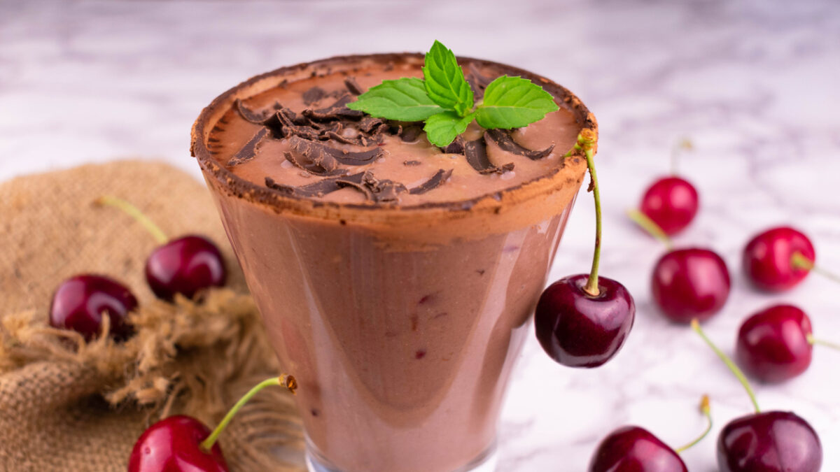 Chocolate smoothie with sour cherries. Close-up.
