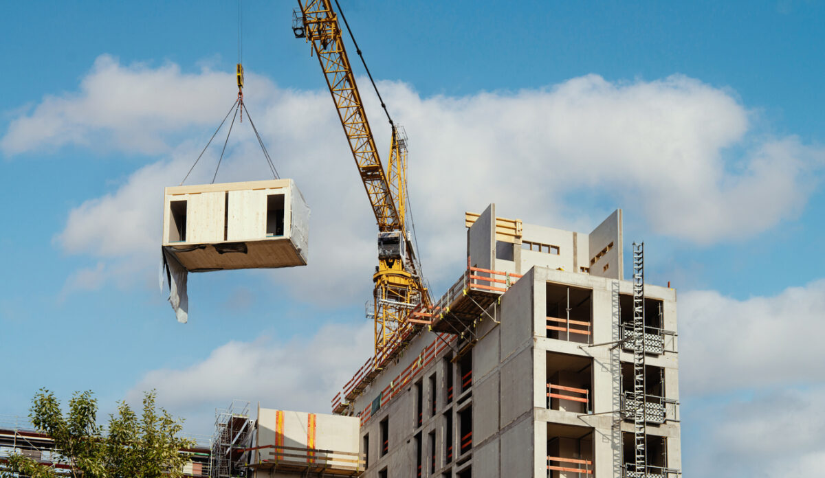 Construction site of an office building in Berlin. The new structure will be built in modular timber construction.