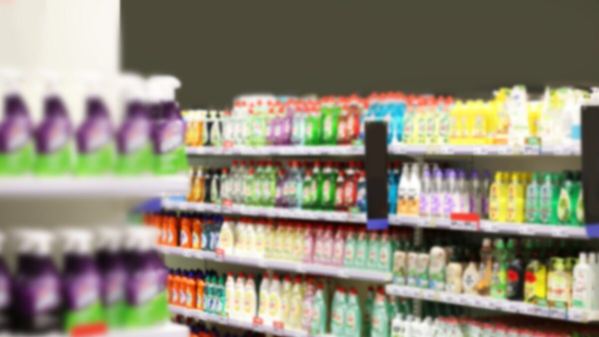 choosing detergents, toilet paper in supermarket.empty grocery cart in an empty supermarket