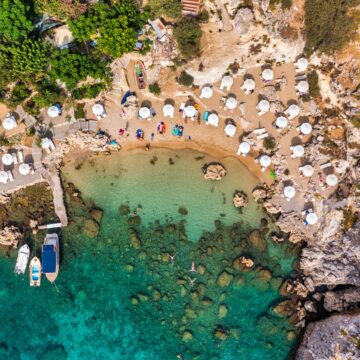 Aerial view on St. Paul's bay in Lindos, Rhodes island, Greece. Panoramic shot overlooking St Pauls Bay at Lindos on the Island of Rhodes, Greece, Europe.