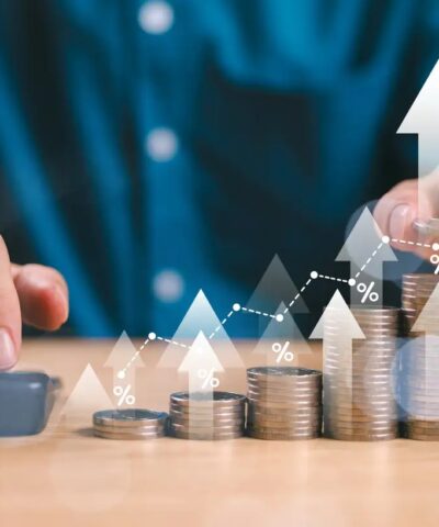 Money interest rate increase concept, percentage commission credit. Grow up stock risk management. Bank policy price raise. Businessman with coin, calculate high percentage of company profit dividend