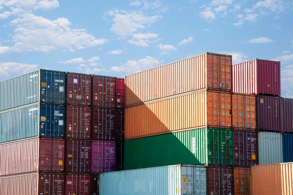Cargo and shipping business. Container ship for import and export logistics. Logistic industry. blue sky copy space background