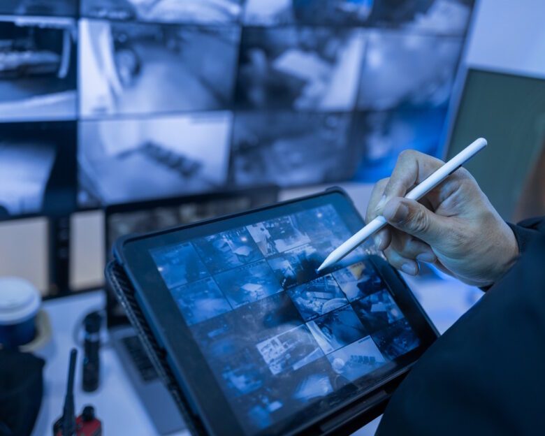 Security Man guard, Working in Control room by cctv monitor for protection, data center or building safety. Inspection, video surveillance agency and control room with footage, View Monitor and computer