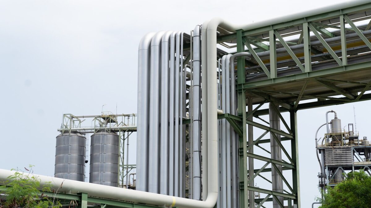 Gas interconnector. Pipeline for natural gas. Natural gas separation plant. Petroleum refinery piping network system. Network of pipes, valves, pumps, mechanisms deliver natural gas