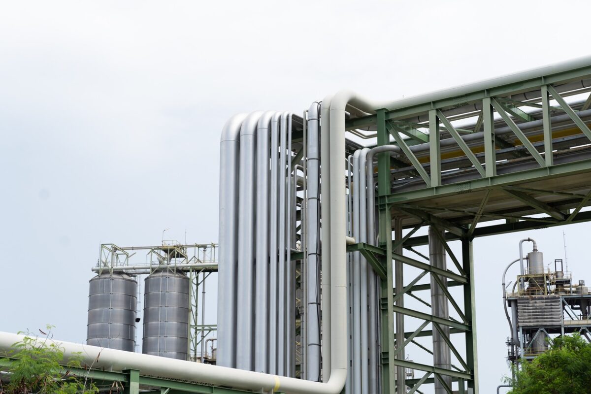 Gas interconnector. Pipeline for natural gas. Natural gas separation plant. Petroleum refinery piping network system. Network of pipes, valves, pumps, mechanisms deliver natural gas