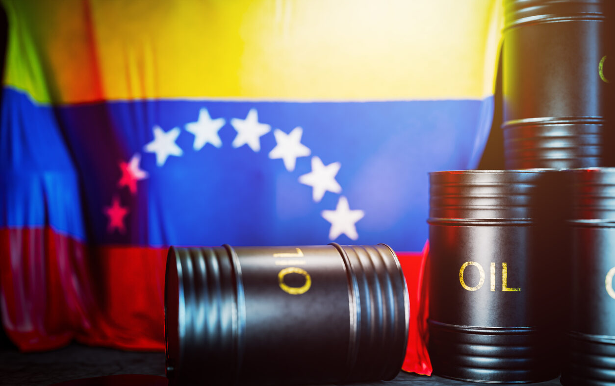 Oil production in Venezuela. The price of oil produced in Venezuela. Venezuelan oil. Black barrels of oil or fuel with the Venezuelan flag. 3D render.
