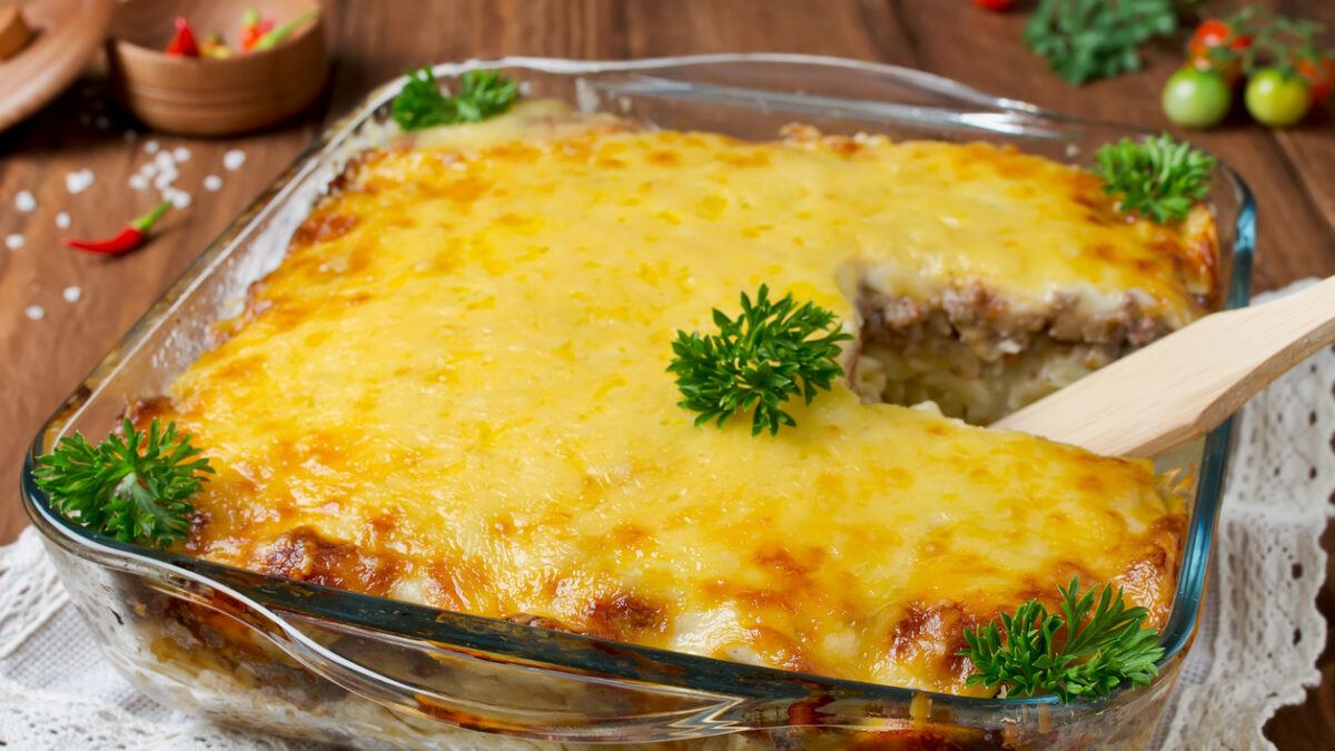 Casserole with pasta and minced meat under a cheese crust