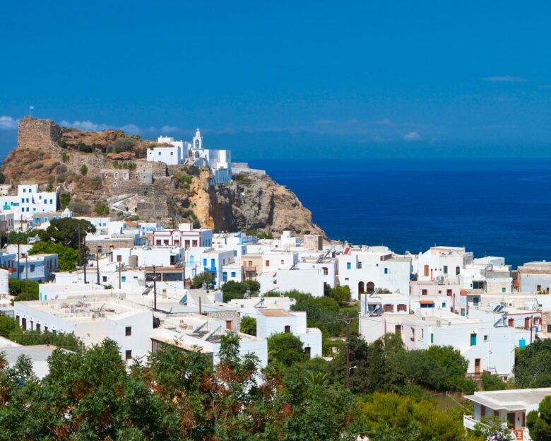 Mandraki village at Nysiros island in Greece. Panagia Spyliani monastery at the background