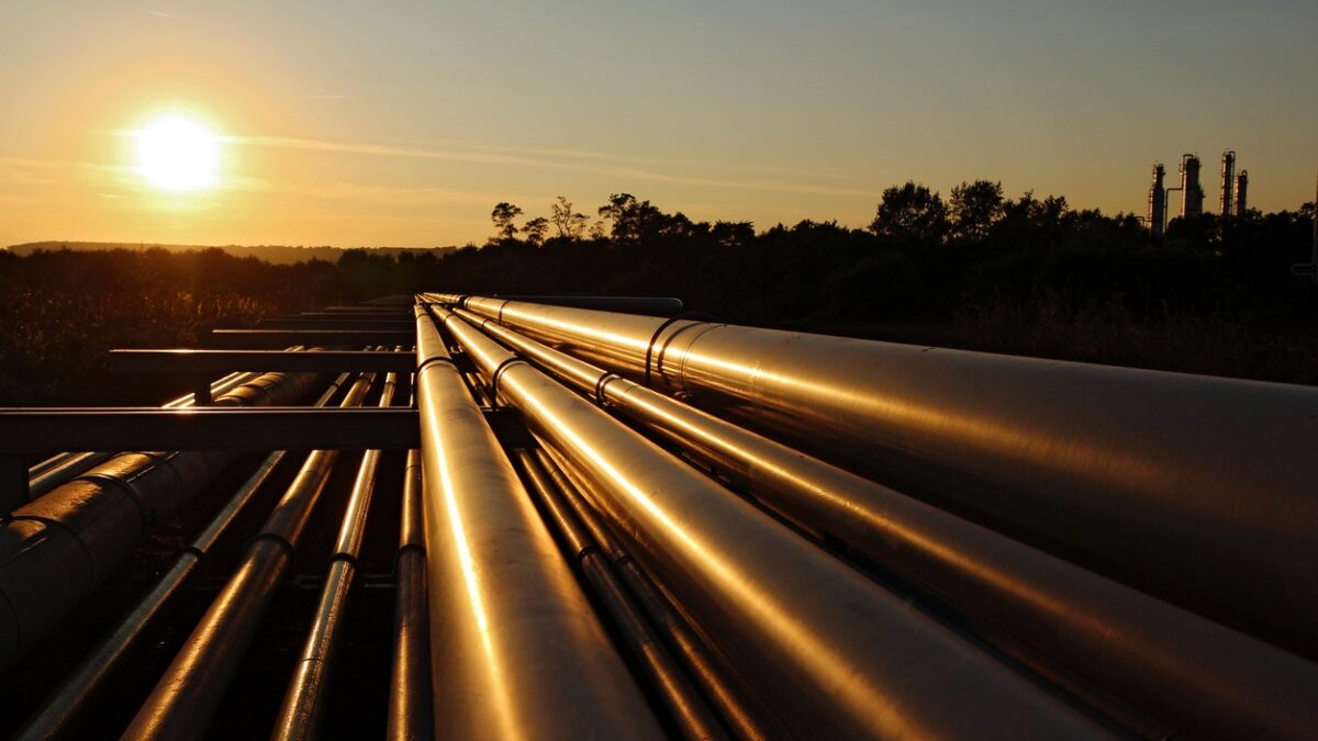 golden colour of steel pipeline system during sunset