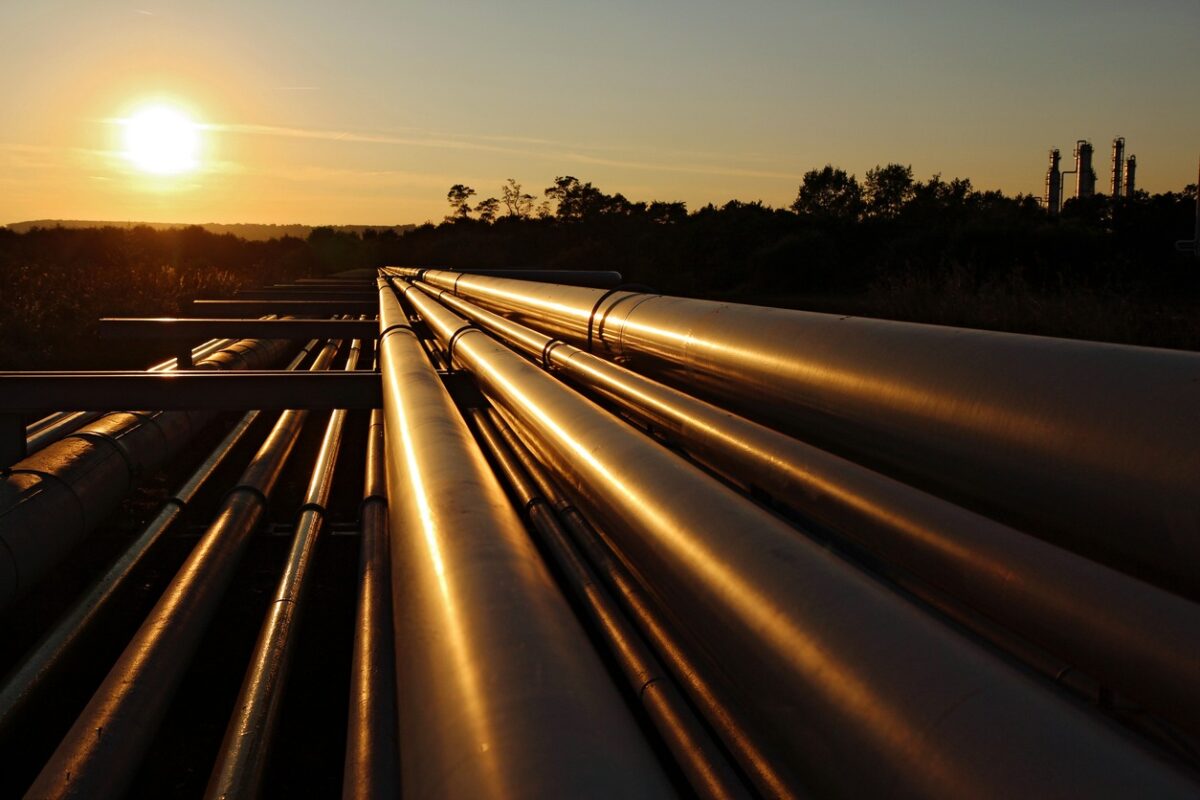 golden colour of steel pipeline system during sunset