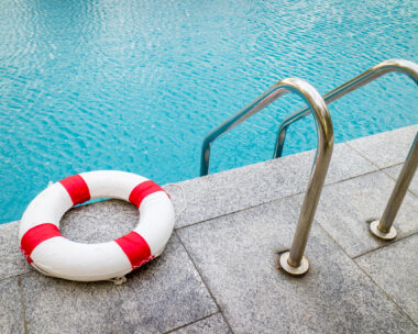 Life ring at swimming pool.emergency tire floating at swimming pool.