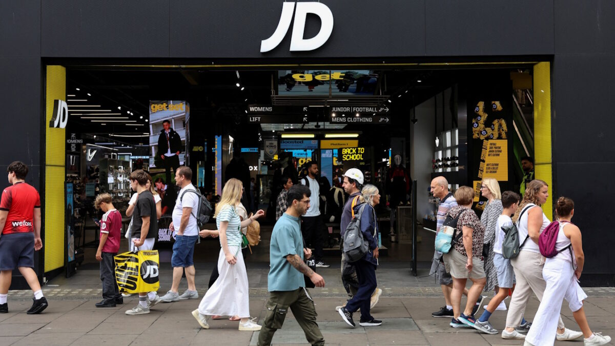 People walk past a JD Sports store in London, Britain, August 19, 2026.