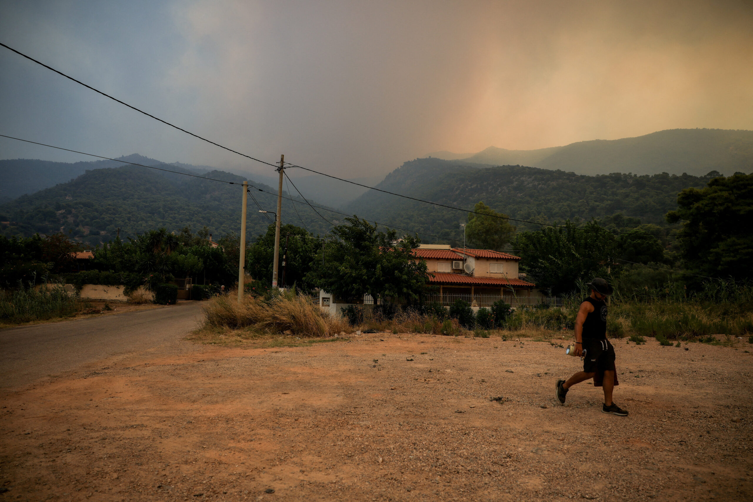 Wildfire in Psatha Smoke rises during a wildfire in Psatha, near Porto Germeno, Greece, August 1, 2026. REUTERS/Louisa Gouliamaki REFILE - ADDING INFORMATION