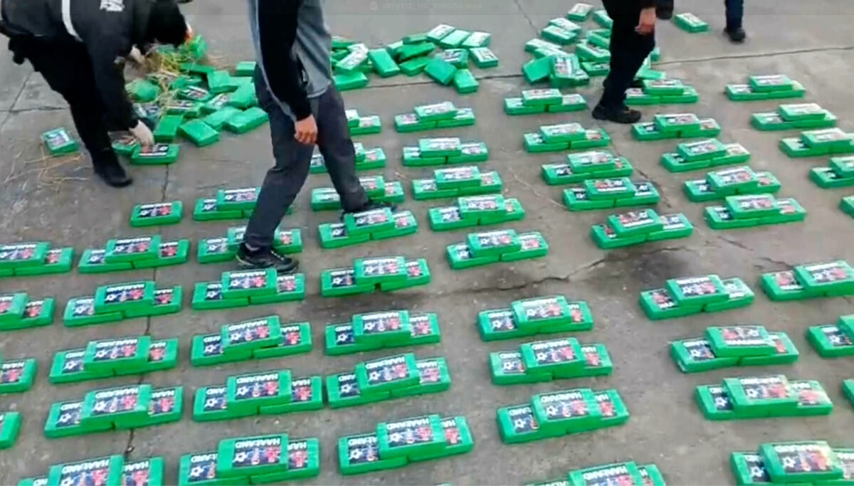 This image from a video released by Ecuador National Police, shows alleged bricks of cocaine which Ecuadorian police removed from a truck in Carchi, Ecuador Wednesday, Aug. 12, 2026. (Ecuador National Police via AP)