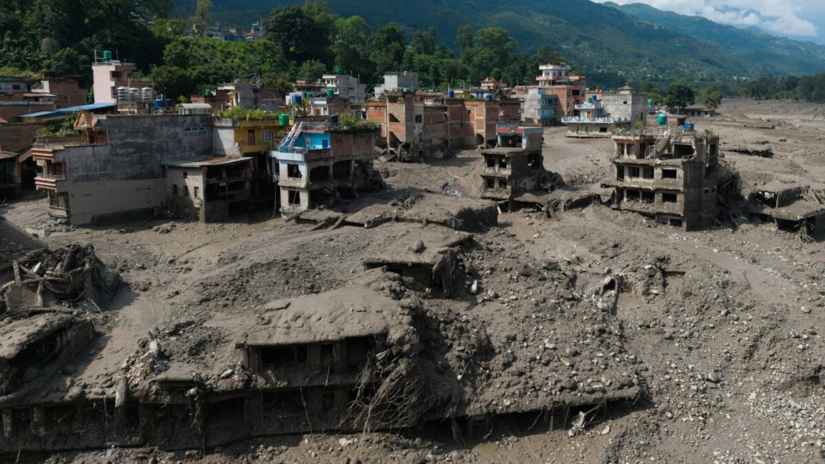 A drone view shows mud covering properties following a flash flood at Trishuli in Nuwakot district, Nepal, August 26, 2026. REUTERS/Stringer
