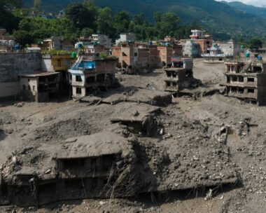 A drone view shows mud covering properties following a flash flood at Trishuli in Nuwakot district, Nepal, August 26, 2026. REUTERS/Stringer