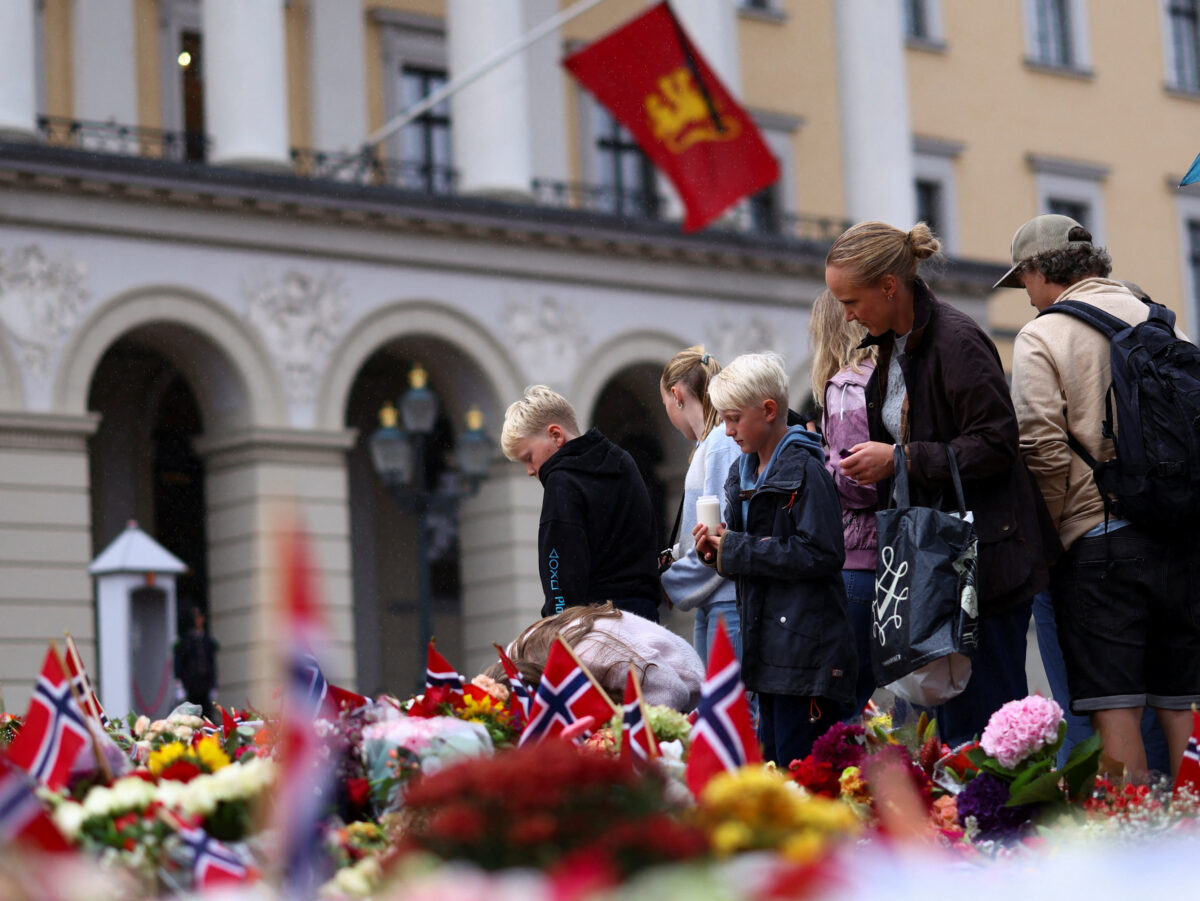 People gather to pay their respects outside the Royal Palace, following the death of Norway's King Harald in Oslo, Norway, August 29, 2026. REUTERS