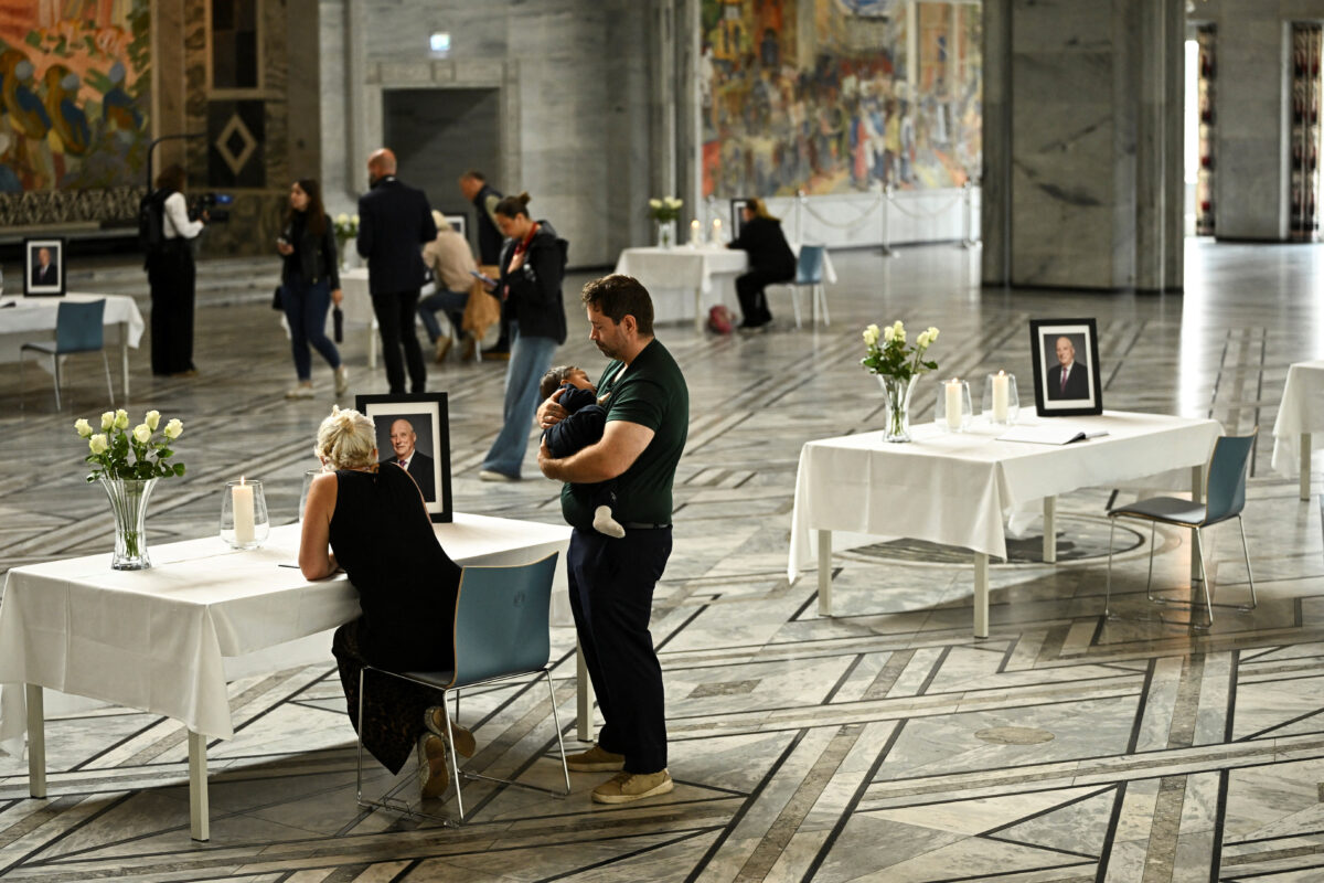People sign in books of condolence for Norway's late King Harald, who died on Friday, at the Town Hall in Oslo, Norway, August 29, 2026. REUTERS