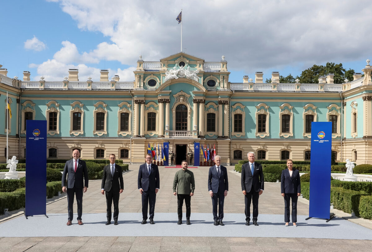 Ukraine's President Volodymyr Zelenskiy, Denmark's Prime Minister Mette Frederiksen, Latvia's Prime Minister Andris Kulbergs, Lithuania's President Gitanas Nauseda, Finland's President Alexander Stubb, Norway's Prime Minister Jonas Gahr Stoere and Estonia's Prime Minister Kristen Michal take part in the family photo ceremony before a Ukraine-Nordic-Baltic summit (NB8), amid Russia's attack on Ukraine, in Kyiv, Ukraine August 23, 2026. REUTERS