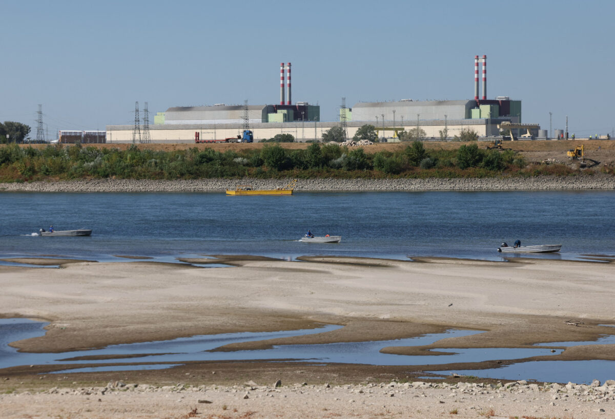Members of the Water Management Authory prepare the construction on a riverbed sill to raise the Danube's water level near the Paks Nuclear Power Plant in Dunaszentbenedek, Hungary, August 13, 2026. REUTERS/Bernadett Szabo