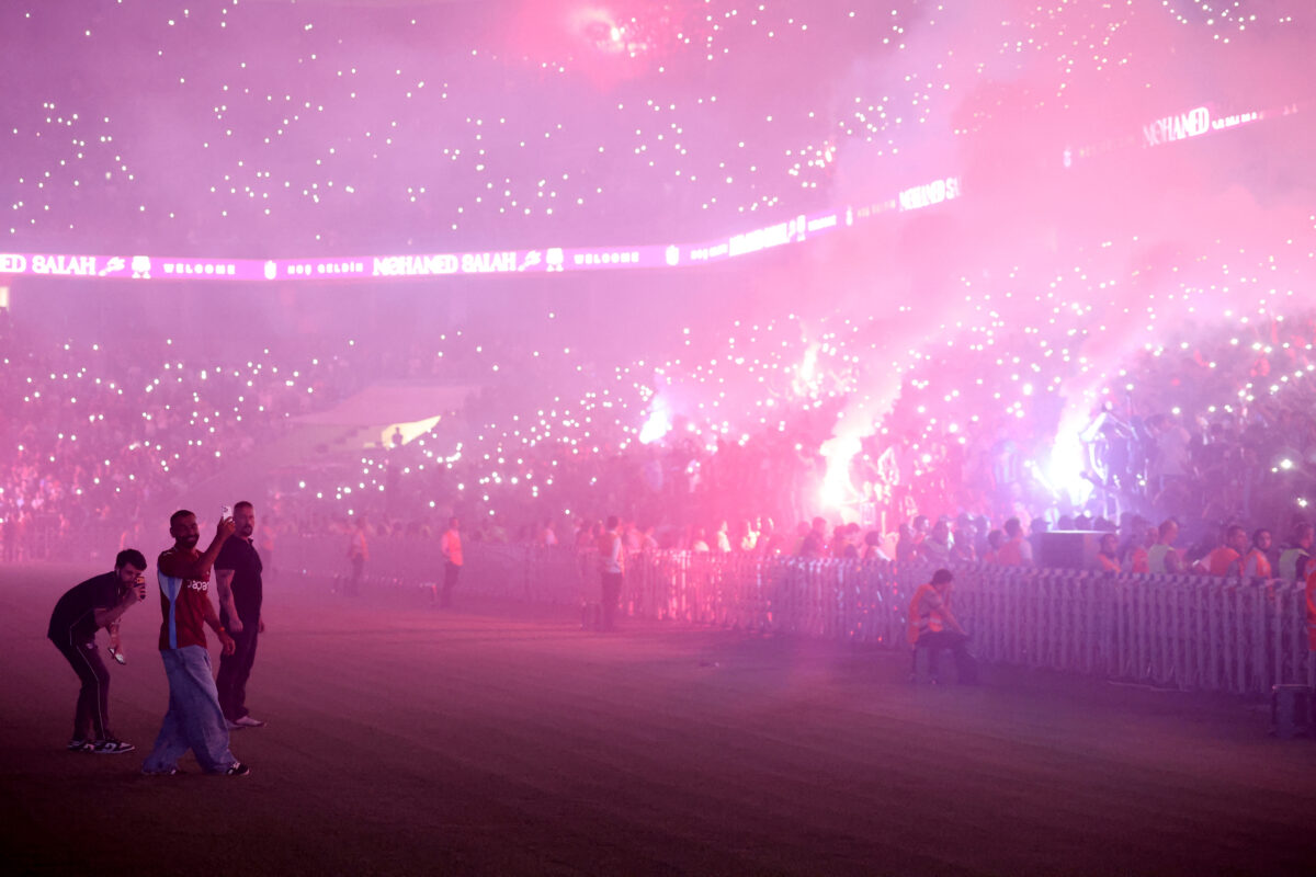 Soccer Football - Trabzonspor unveil new signing Mohamed Salah - Papara Park, Trabzon, Turkey - August 6, 2026 Trabzonspor's new signing Mohamed Salah takes photos of the fans from the pitch REUTERS