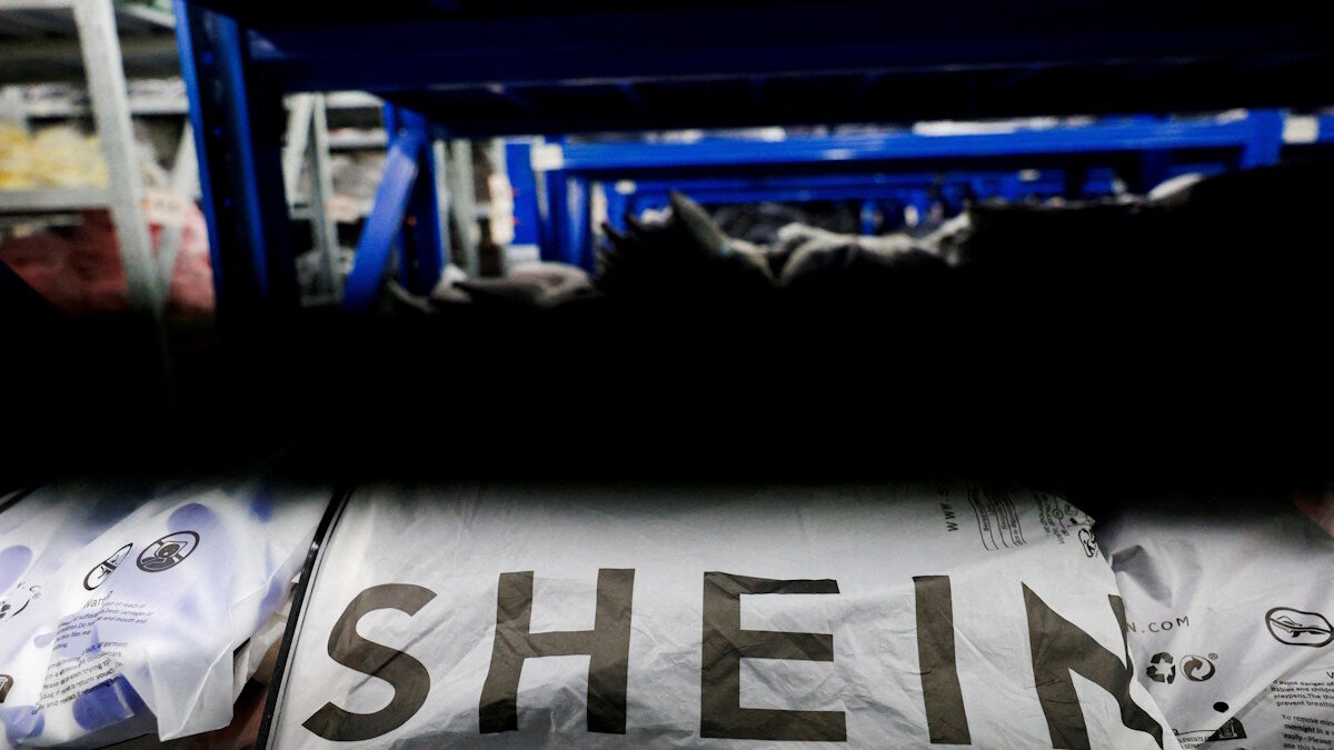 FILE PHOTO: FILE PHOTO: Packs of clothing are displayed at a garment factory for Shein in Panyu District, Guangzhou, Guangdong province, China, July 27, 2026. REUTERS