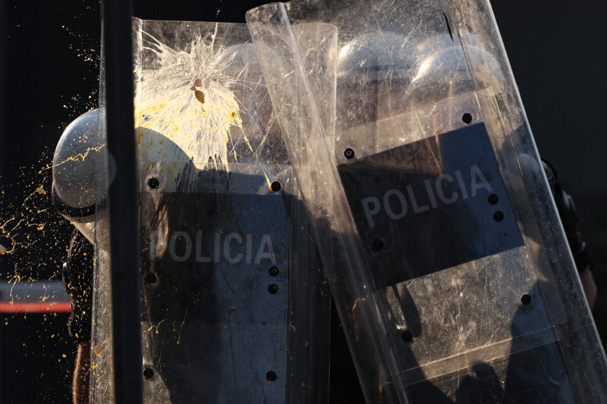 Police cover themselves with their shields during a demonstration against the government, following months of protests against a planned luxury resort backed by a company linked to Jared Kushner, the son-in-law of U.S. President Donald Trump, on an environmentally sensitive part of the Adriatic coast, in Tirana, Albania, September 8, 2026. REUTERS