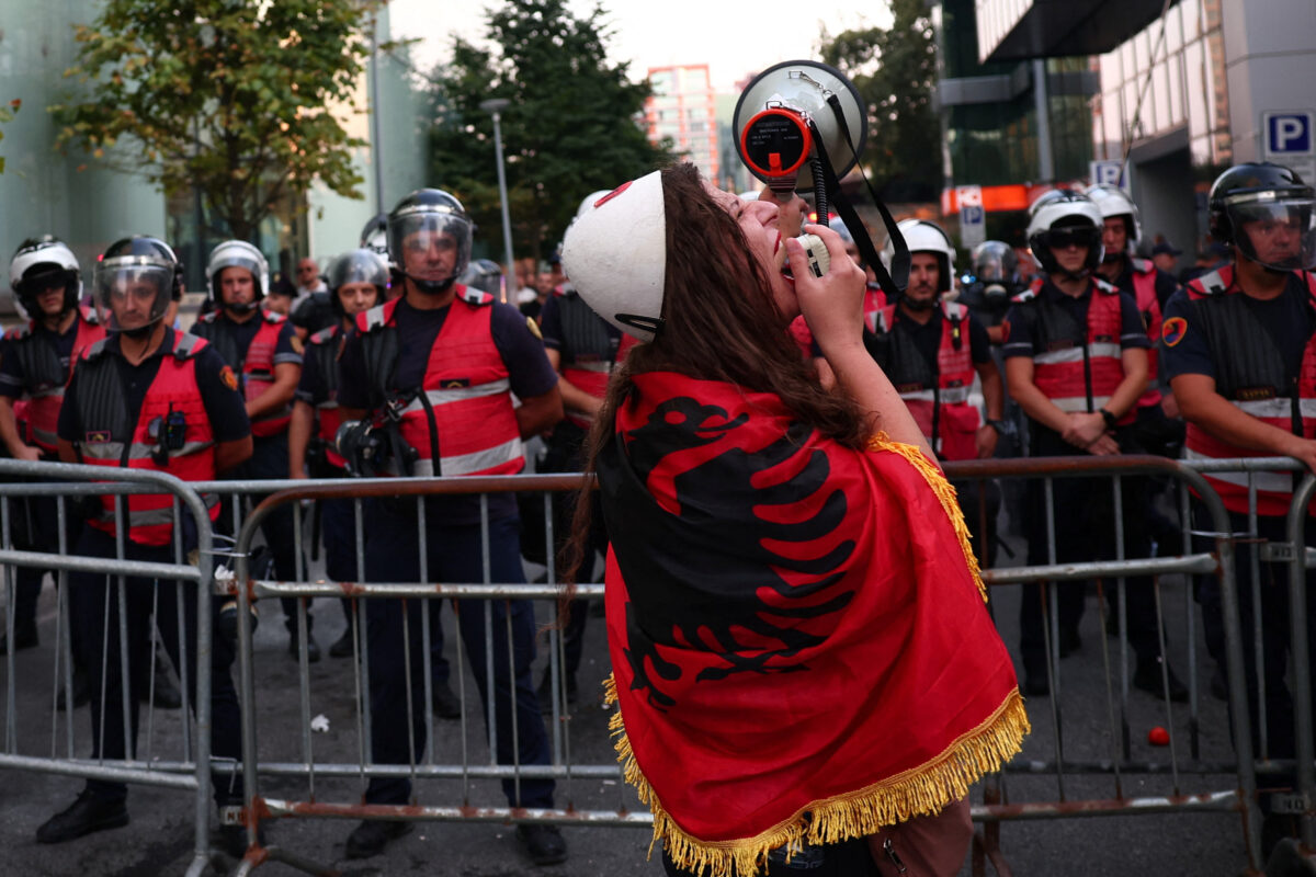 A protester shouts slogans during a demonstration against the government, following months of protests against a planned luxury resort backed by a company linked to Jared Kushner, the son-in-law of U.S. President Donald Trump, on an environmentally sensitive part of the Adriatic coast, in Tirana, Albania, September 8, 2026. REUTERS