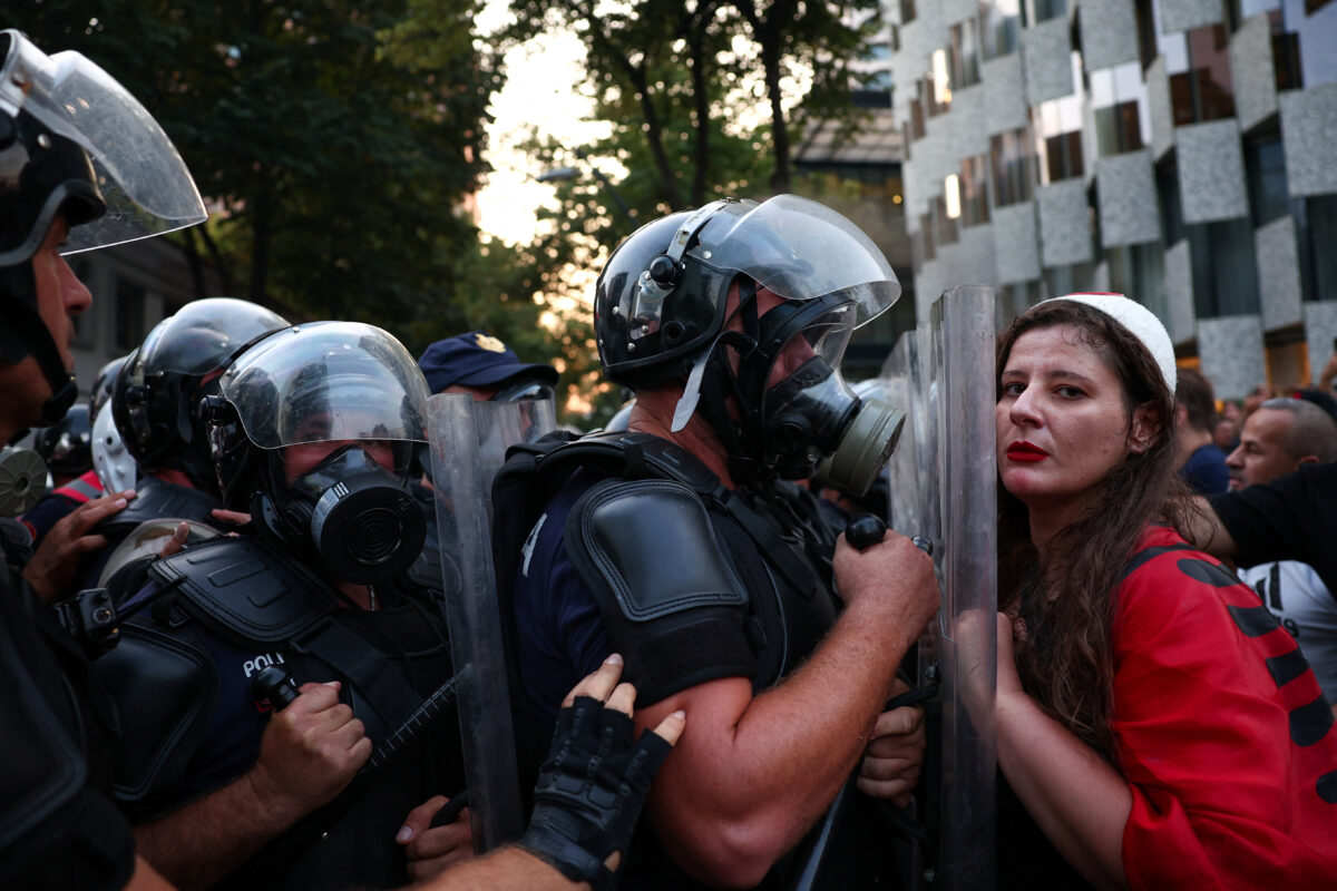A protester looks on during a demonstration against the government, following months of protests against a planned luxury resort backed by a company linked to Jared Kushner, the son-in-law of U.S. President Donald Trump, on an environmentally sensitive part of the Adriatic coast, in Tirana, Albania, September 8, 2026. REUTERS