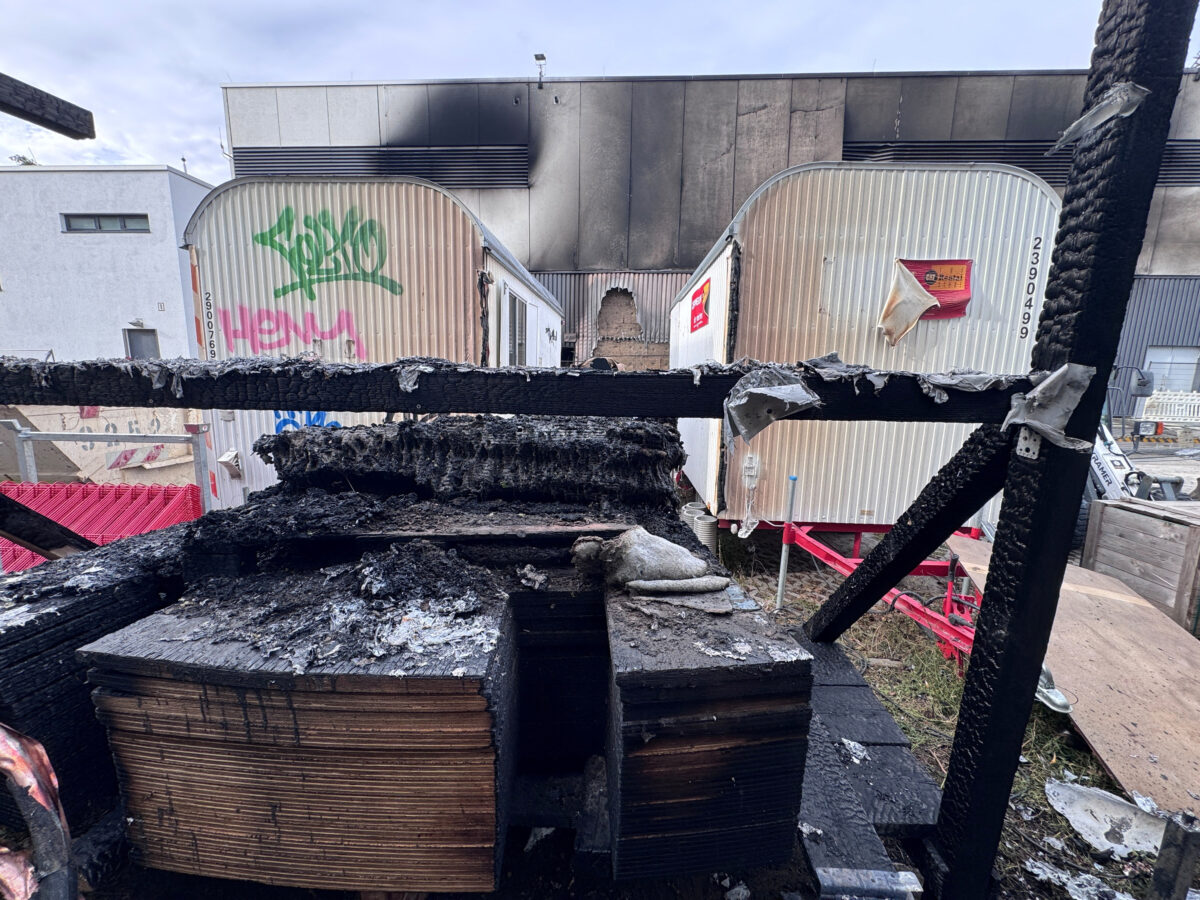 Burned building materials sit at a construction site on the ground of a substation, as police is investigating a fire at the transformer substation, further raising security concerns over a series of sabotage attacks on Germany's power grid, in Berlin, Germany, September 7, 2026. Sign reads "No entry to the construction site". REUTERS/Tobias Schlie