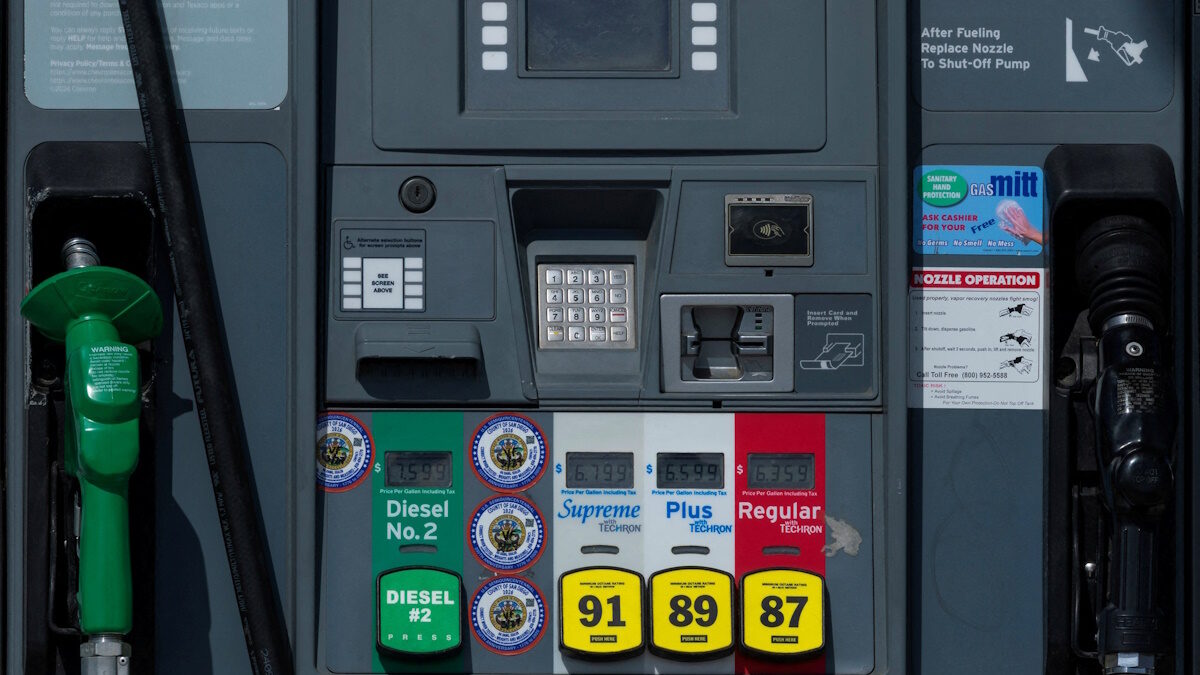 FILE PHOTO: The price of gasoline is displayed on gas pumps at the gas station near the highway in Encinitas, California, U.S., April 30, 2026.