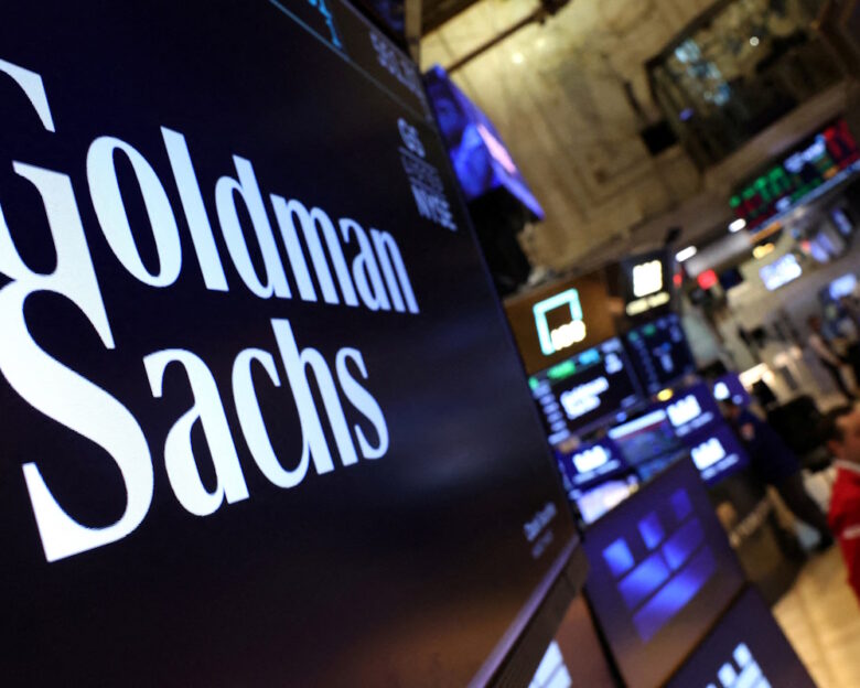 FILE PHOTO: A screen displays the the company logo for Goldman Sachs on the floor at the New York Stock Exchange (NYSE) in New York City, U.S., May 7, 2025. REUTERS/Brendan McDermid/File Photo