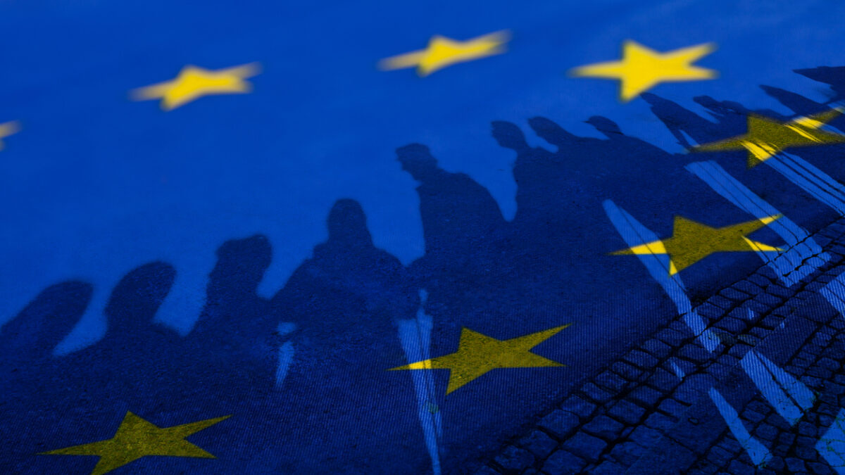 Flag of European Union with silhouette of people