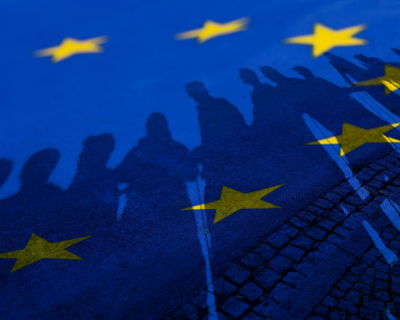 Flag of European Union with silhouette of people