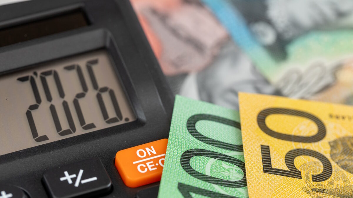 Australia money. Finances 2026. Business and economic concept. Symbol of the Australian dollar. Year 2026 displayed on a calculator. Financial background. Close up