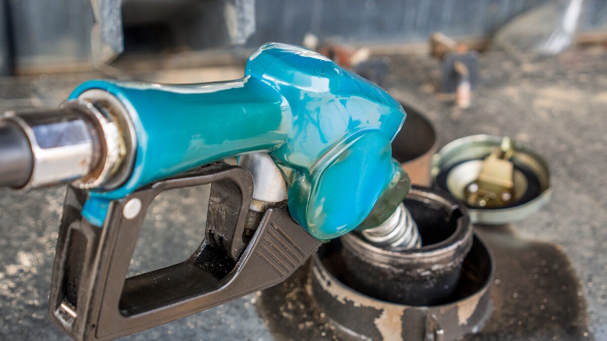 fuel Nozzle , filling gas in a gas station.
