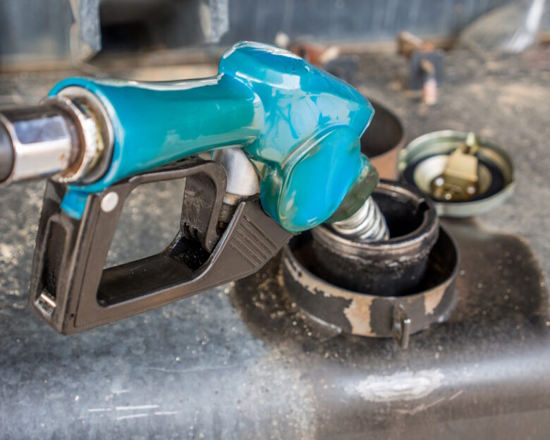 fuel Nozzle , filling gas in a gas station.