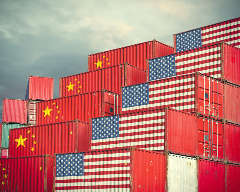 Chinese and United Stases cargo containers reflecting trade war and restrictions in export and import