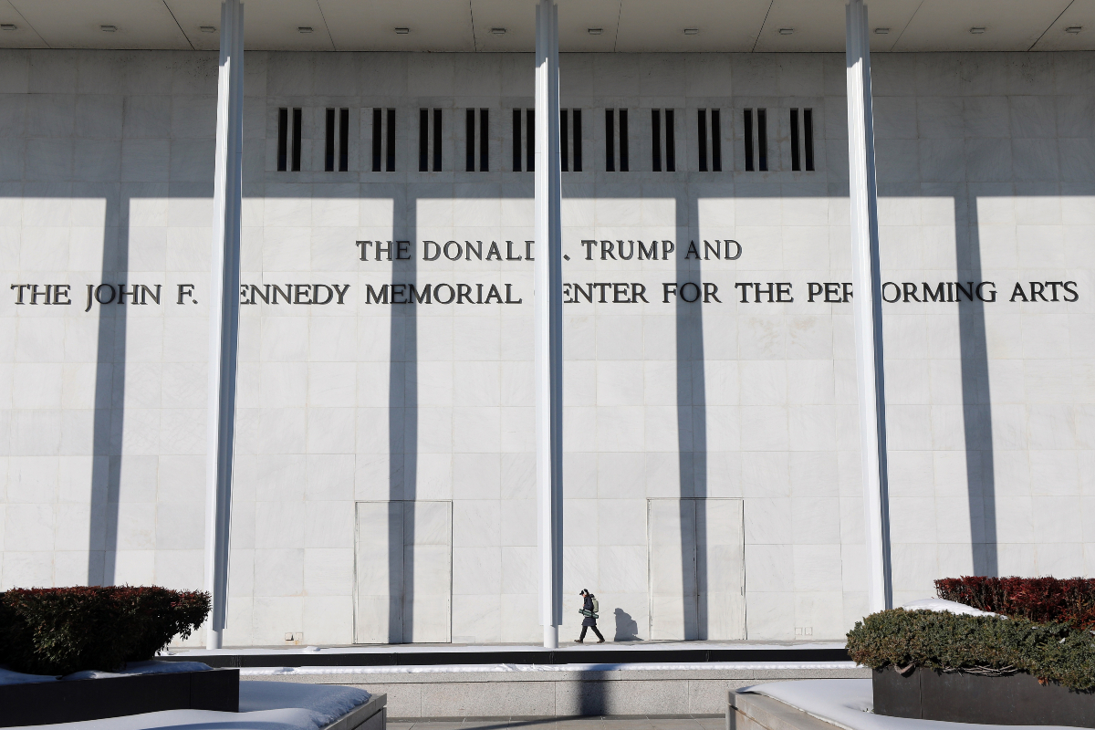 FILE - A woman walks outside The John F. Kennedy Memorial Center for the Performing Arts, Feb. 2, 2026 in Washington.